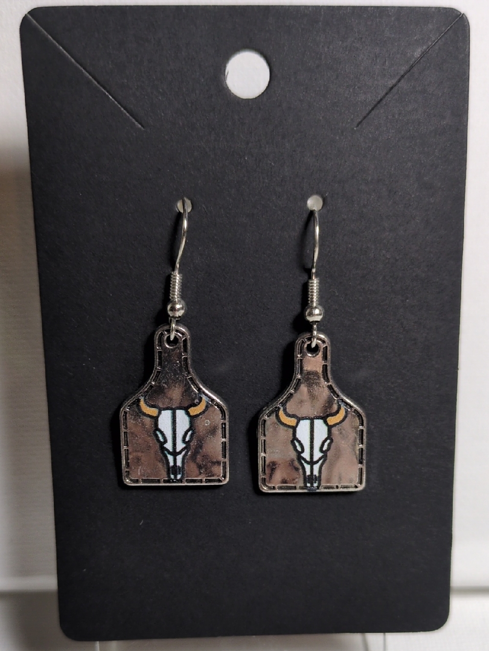 Cow Skull Dangle Earrings in Brown and White
